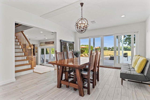 231 Pawson Rd, Branford, CT 06405 - dining room with french doors, a chandelier, stairway, healthy amount of natural light, and recessed lighting