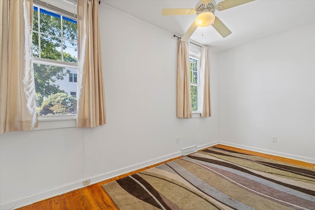 231 Pawson Rd, Branford, CT 06405 - spare room with wood finished floors and baseboards