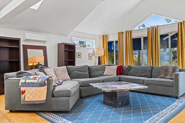 231 Pawson Rd, Branford, CT 06405 - living room featuring a wall mounted AC, wood finished floors, plenty of natural light, and vaulted ceiling