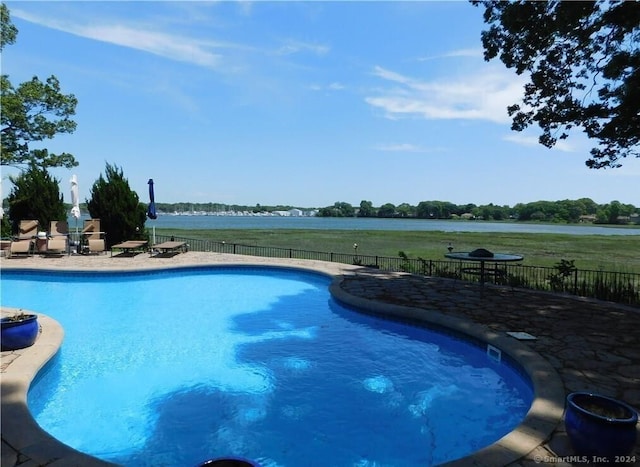 231 Pawson Rd, Branford, CT 06405 - view of swimming pool featuring fence, a patio area, and a water view