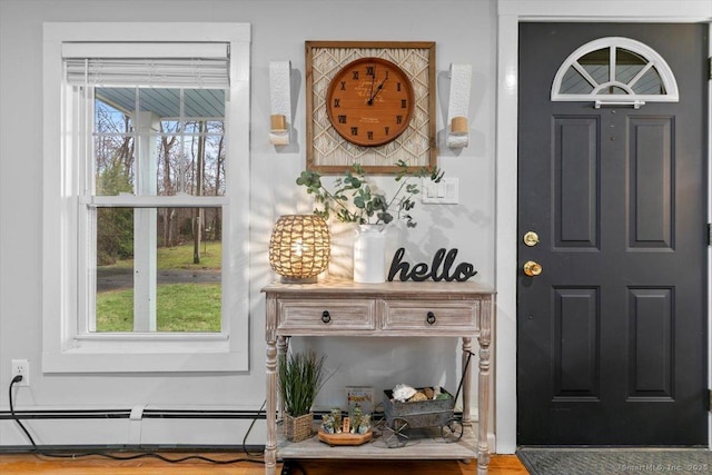 interior space featuring baseboard heating