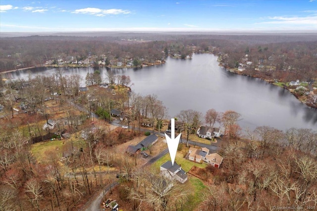 bird's eye view with a forest view, a residential view, and a water view