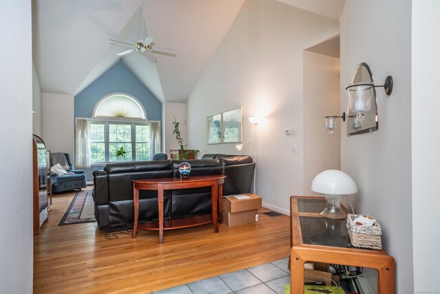 175 Thistle Pond Dr Unit 175, Bloomfield, CT 06002 - living area with ceiling fan, light tile patterned floors, and vaulted ceiling