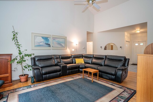 175 Thistle Pond Dr Unit 175, Bloomfield, CT 06002 - living area featuring light wood-type flooring, ceiling fan, and a towering ceiling