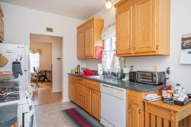 175 Thistle Pond Dr Unit 175, Bloomfield, CT 06002 - kitchen featuring white appliances, a sink, dark countertops, and a desk