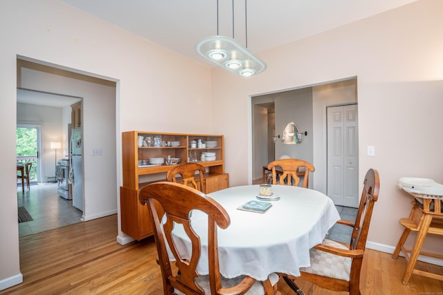 175 Thistle Pond Dr Unit 175, Bloomfield, CT 06002 - dining room with light wood-type flooring and baseboards