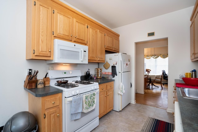 175 Thistle Pond Dr Unit 175, Bloomfield, CT 06002 - kitchen featuring white appliances and dark countertops