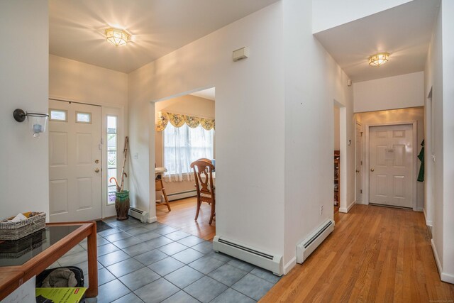 175 Thistle Pond Dr Unit 175, Bloomfield, CT 06002 - entrance foyer featuring baseboard heating and light tile patterned floors