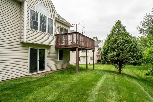 175 Thistle Pond Dr Unit 175, Bloomfield, CT 06002 - back of property with a wooden deck and a yard