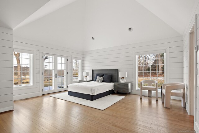 3 Mayflower Ln, Weston, CT 06883 - bedroom with french doors, high vaulted ceiling, access to outside, and light wood finished floors