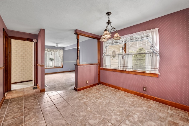 39 Smith St, Bristol, CT 06010 - unfurnished dining area with baseboards, a chandelier, a ceiling fan, and a textured ceiling