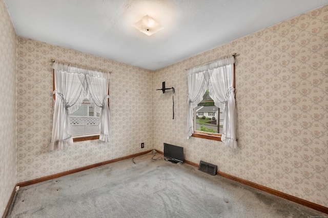 39 Smith St, Bristol, CT 06010 - unfurnished room featuring baseboards and carpet flooring