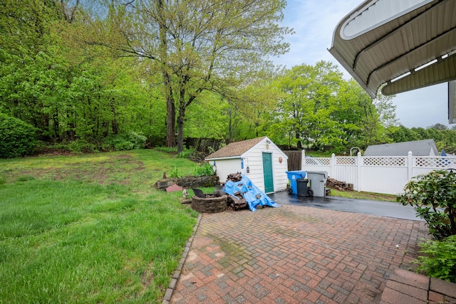39 Smith St, Bristol, CT 06010 - view of yard featuring a patio area, an outdoor structure, and a shed