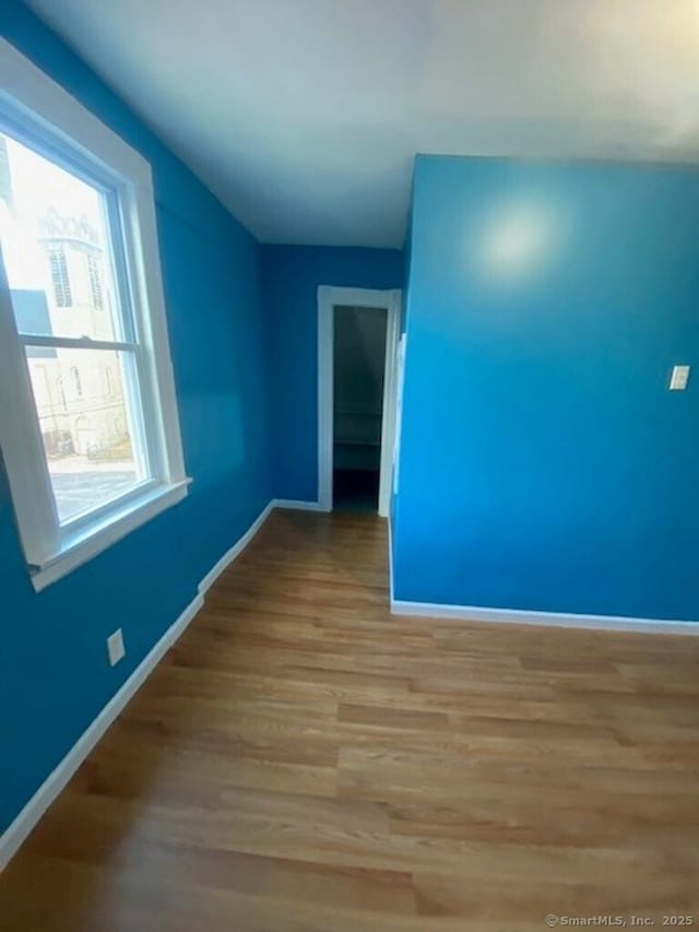 266 Willow St, Waterbury, CT 06710 - spare room featuring baseboards and light wood-style floors