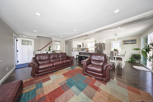 living room with baseboards, stairs, dark wood-style floors, and recessed lighting