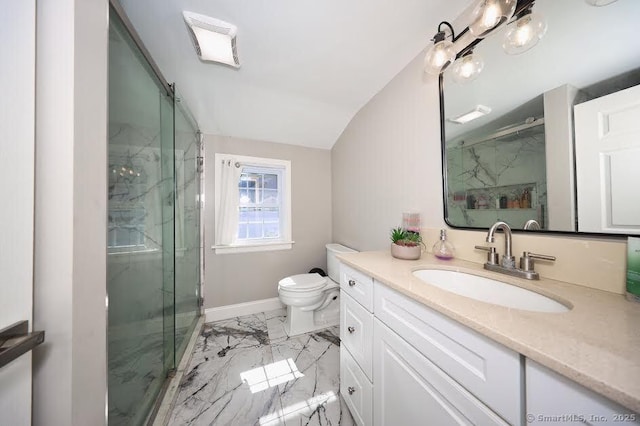 bathroom featuring marble finish floor, vanity, a marble finish shower, and toilet