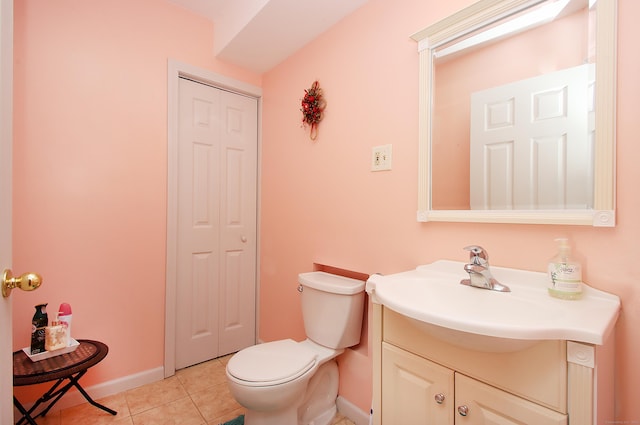 155 Riverside Dr, Meriden, CT 06451 - bathroom featuring vanity, toilet, tile patterned floors, baseboards, and a closet