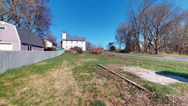 view of yard featuring fence