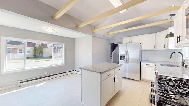 kitchen featuring stainless steel fridge with ice dispenser, a sink, a kitchen island, light stone countertops, and baseboard heating