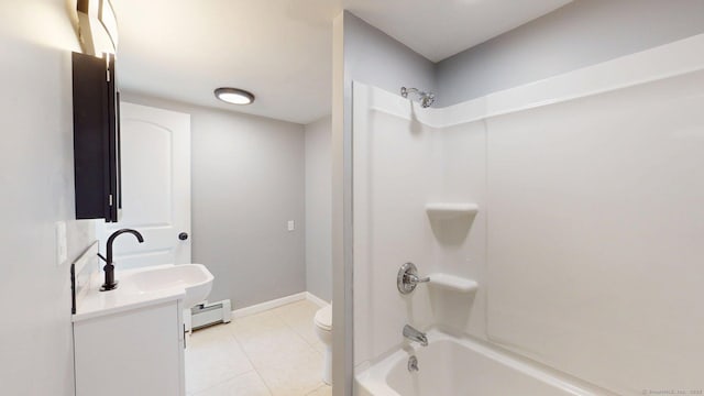 full bath featuring tile patterned floors, toilet, vanity, shower / tub combination, and baseboard heating
