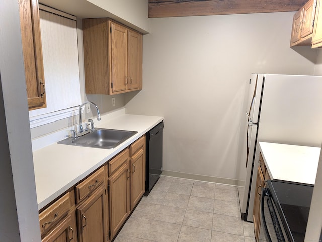 839 Main St Apt 28, Torrington, CT 06790 - kitchen with a sink, black dishwasher, stove, light countertops, and baseboards