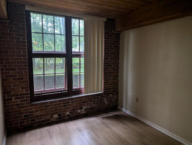 839 Main St Apt 28, Torrington, CT 06790 - spare room featuring wooden ceiling, wood finished floors, and baseboards