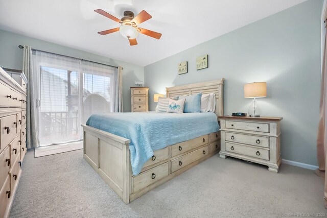 76 Carriage Path S Unit 76, Milford, CT 06460 - bedroom featuring baseboards, access to exterior, a ceiling fan, and light colored carpet