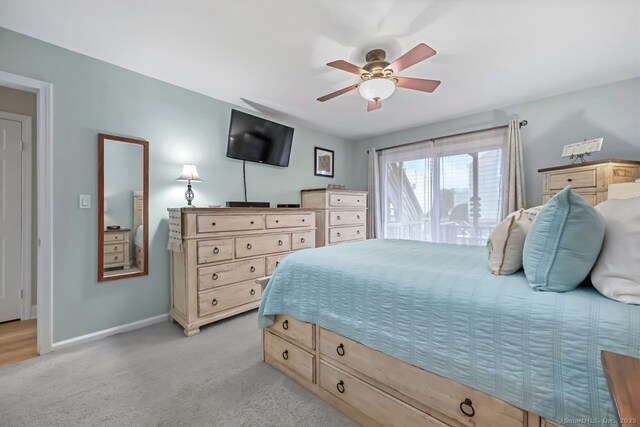 76 Carriage Path S Unit 76, Milford, CT 06460 - bedroom featuring baseboards, light colored carpet, and ceiling fan