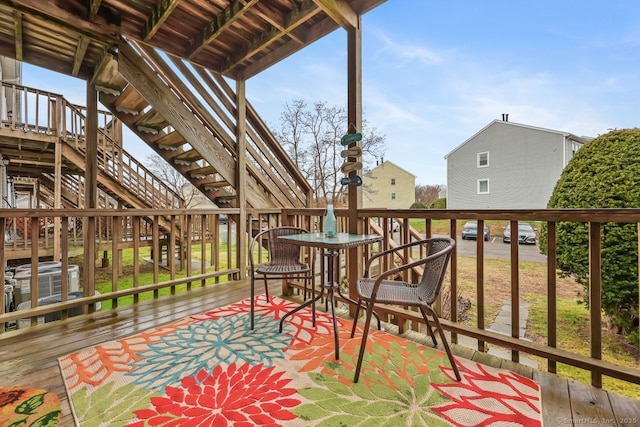 76 Carriage Path S Unit 76, Milford, CT 06460 - view of wooden balcony with a wooden deck