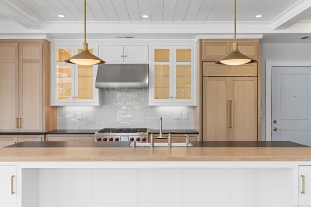 22 W Main St Unit 3, Groton, CT 06355 - kitchen featuring under cabinet range hood, a sink, decorative backsplash, and recessed lighting