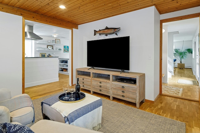 living area with recessed lighting, wood ceiling, baseboards, and wood finished floors