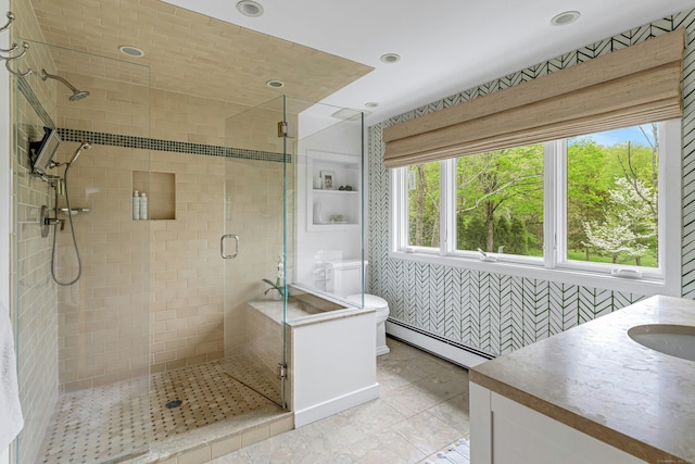 full bathroom with a baseboard radiator, recessed lighting, toilet, a shower stall, and vanity