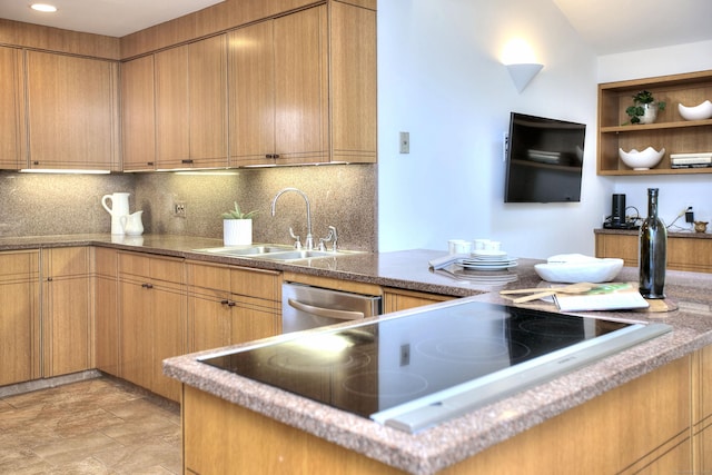 kitchen featuring black electric stovetop, a sink, tasteful backsplash, and stainless steel dishwasher
