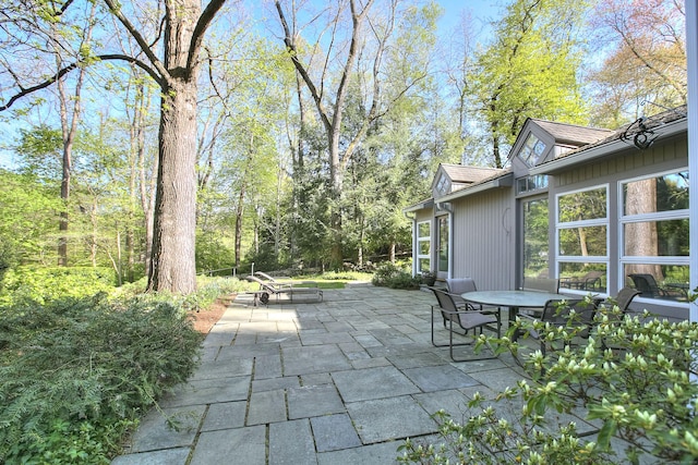 view of patio featuring outdoor dining area