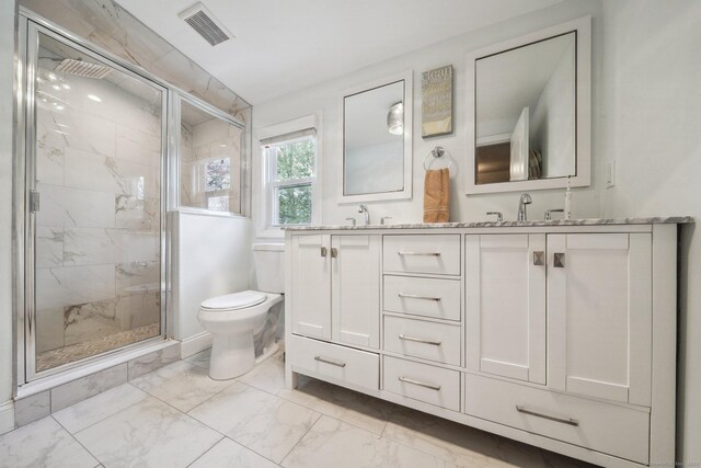 full bathroom with a marble finish shower, a sink, toilet, visible vents, and marble finish floor