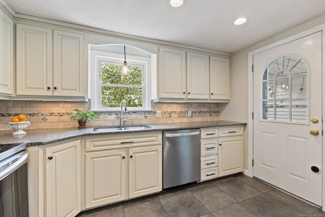 81 Beelzebub Rd, South Windsor, CT 06074 - kitchen with stainless steel dishwasher, a sink, cream cabinets, backsplash, and range with electric cooktop