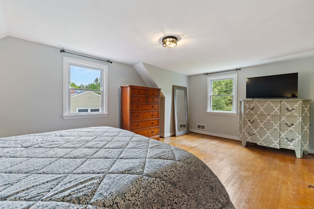 81 Beelzebub Rd, South Windsor, CT 06074 - bedroom with wood finished floors, lofted ceiling, and baseboards