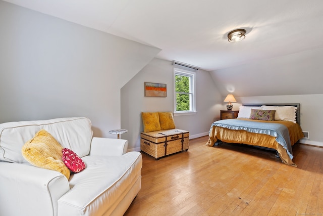 81 Beelzebub Rd, South Windsor, CT 06074 - bedroom with light wood-style floors, vaulted ceiling, and baseboards