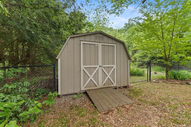 81 Beelzebub Rd, South Windsor, CT 06074 - view of shed with a fenced backyard and a gate