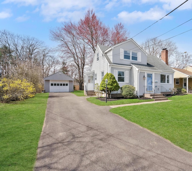 17 Lydall Rd, East Hartford, CT 06111 - view of front of home with an outbuilding, a detached garage, a chimney, roof with shingles, and a front lawn