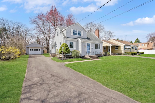 17 Lydall Rd, East Hartford, CT 06111 - view of front of home featuring an outdoor structure, a detached garage, a chimney, and a front yard