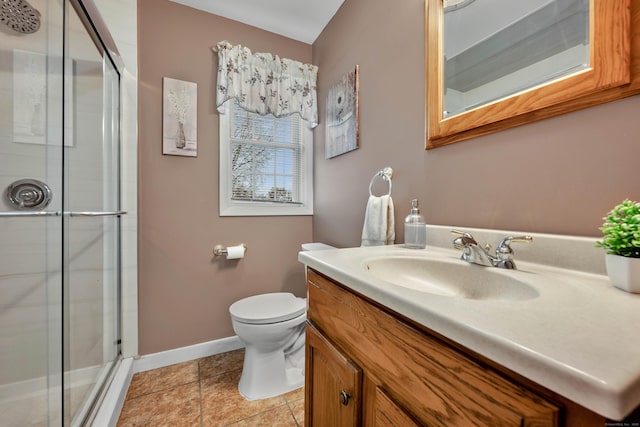 full bathroom featuring baseboards, a shower stall, and toilet