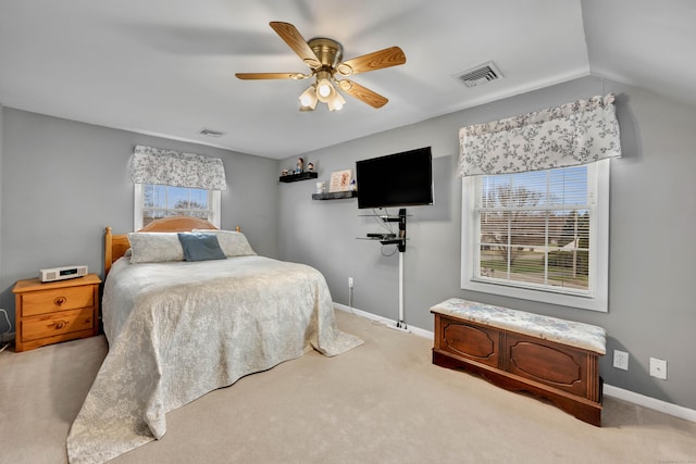 bedroom featuring baseboards, visible vents, and carpet