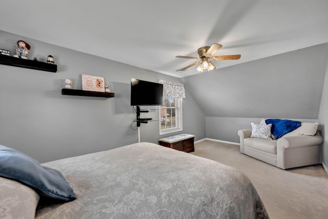 bedroom with lofted ceiling, baseboards, a ceiling fan, and carpet floors