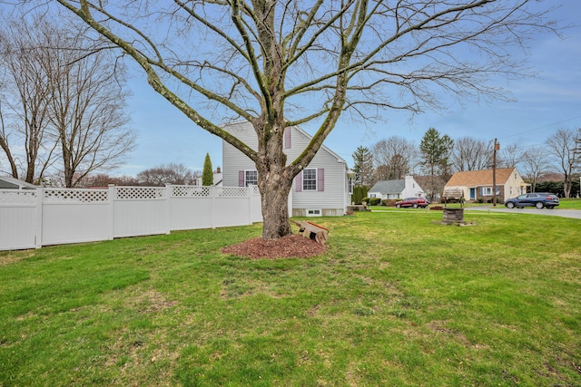 view of yard featuring fence