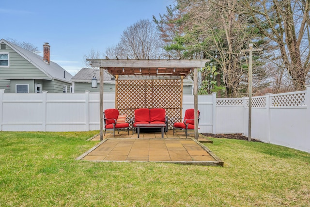 view of yard with outdoor lounge area, a pergola, a fenced backyard, and a patio area
