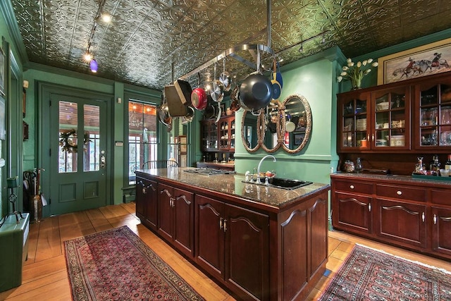 77 Main St, East Haddam, CT 06423 - bar area with a sink, an ornate ceiling, crown molding, light wood-type flooring, and a chandelier