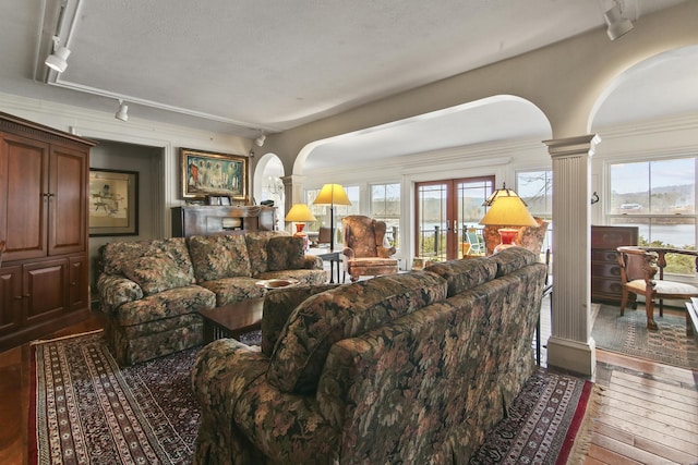 77 Main St, East Haddam, CT 06423 - living area featuring arched walkways, ornate columns, and track lighting