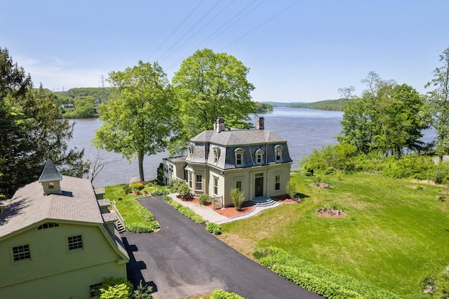 77 Main St, East Haddam, CT 06423 - view of front of property with a water view, a front lawn, and a chimney