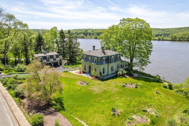 77 Main St, East Haddam, CT 06423 - view from above of property featuring a nearby body of water and a heavily wooded area
